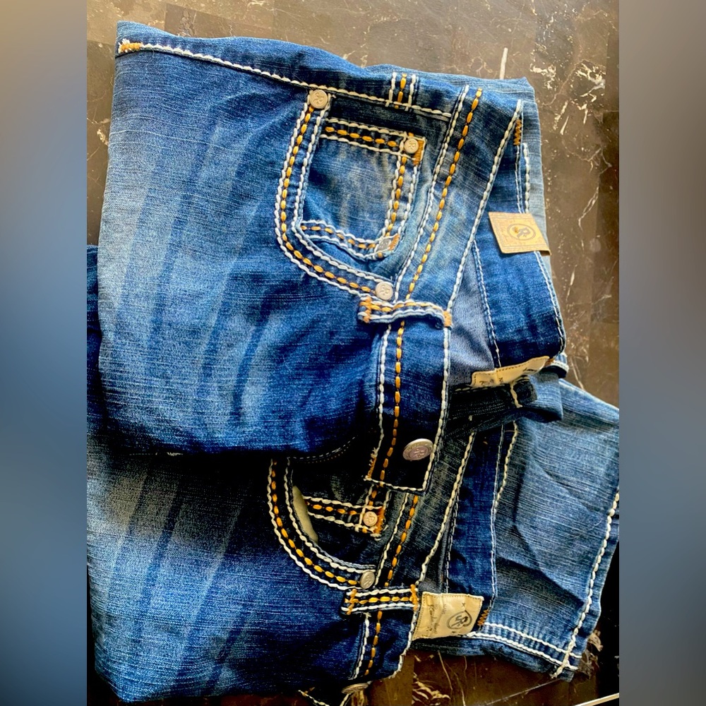 2 pairs of size 17 realco jeans.
